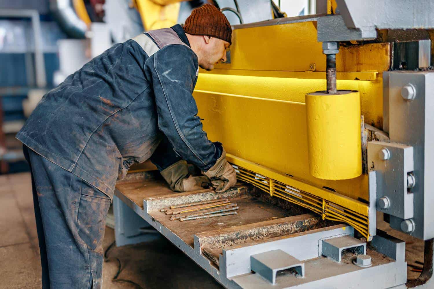 how do you ensure the safety of operators when using a metal guillotine